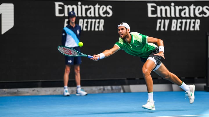 Karen Khachanov of Russia plays against Jannik Sinner of...